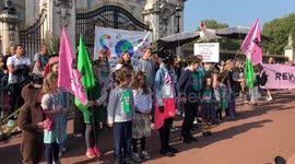 SOS From The Kids Choir Outside Buckingham Palace  at Rewild The Royals Petition with Chris Packham outside Buckingham Palace
