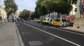 Greenpeace protesters stage a lock on outside downing Street in protest of Cambo oilfield