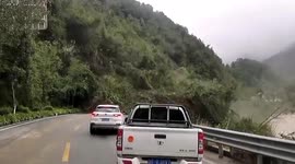 Massive landslide crashes down mountainside blocking road in northern China