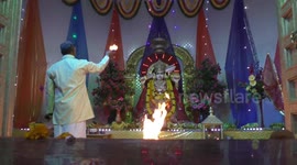 Hindu Priest and Devotees offers prayers to Goddess during Navratri Festival in India