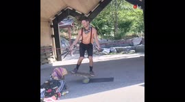 'Daring Canadian street performer juggles knives while balancing on Rola-Bola'