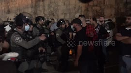 Palestinian protesters clash with police after Israel demolish graveyards near Al-Aqsa mosque