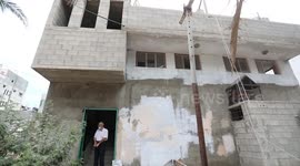 The Commissioner-General of UNRWA, Philippe Lazzarini, speaks during a press confernce, in front of the Salmiya family house which was hit by Israeli strikes during the recent 11-day conflict between Israel and Hamas on May