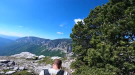 Vertigo inducing footage show man base jumping from 500-meter-high cliff