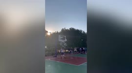 Chinese boy shatters backboard with slam dunk during basketball match