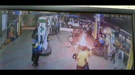 Watch moment quick-thinking gas station clerks avert catastrophe by putting out fire
