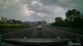DANGEROUS DRIVING: Car stops in middle of highway because of garbage bags on the road (Dashcam Video)