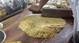 STREET FOOD: Watch these delicious crunchy sweet peanut treats being made in Thailand