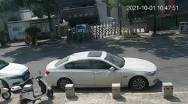 Out of control Porsche car tips over after smashing through gate in eastern China
