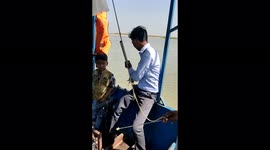Boating in the river of the Ganga by india boy in India and enjoy