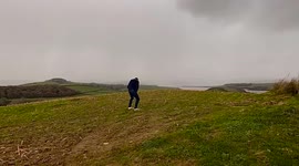 Close lightning bolt drops no more than a mile away whilst setting up GoPro camera to capture thunderstorm