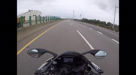 IDIOT ON THE ROAD: Dangerous driving as car takes wrong exit on the highway and reverses back on (Dashcam Video)