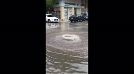 Greece: Dancing Manhole On Flooded Street In Kallithea, Athens