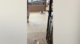 Floods gush through home after heavy rain in Indonesia