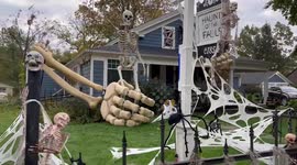 Spooky house decorated with 30-foot-tall SKELETON