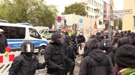Police remove famous Berlin squat project and clash with mounting protesters