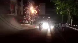 Indonesian firemen fight crackling blaze that originated in electric pole