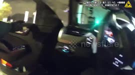 Heroic cops pull an unconscious passenger out of a flaming car