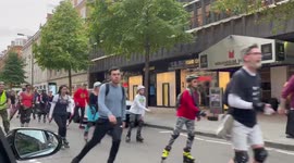 Roller blading event blocks traffic and passes through central London
