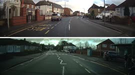 Range Rover overtakes cars on the red light going through wrong side of the road narrowly missing oncoming learner car.