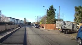 Dad with little kid on dirt bike on public road without helmets , no helmets