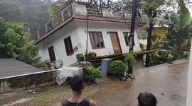 Watch moment building collapses into river during deadly Kerala floods