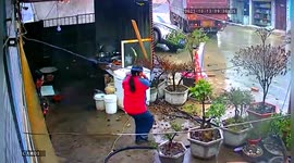 Out of control truck knocks over pedestrian after braking on slippery road in China