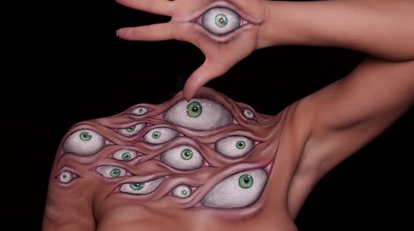Master makeup artist transforms herself into headless 'eye monster' for Halloween