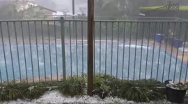 Swimming pool pummelled in New South Wales Australia as country's largest hail-stone ever is recorded