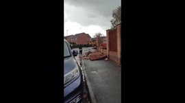 Fences broken, trees snapped and brick walls destroyed as 'tornado' sweeps through Widnes, UK