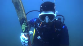Supporters take to the depths to celebrate their cricket team's T20 victory in southern India