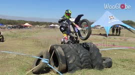 Dirt bike rider goes over handlebars during enduro race in Argentina