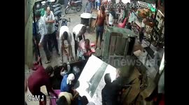 Dramatic moment sinkhole opens outside sweet shop swallowing ten people