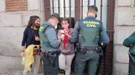 Madrid Extinction Rebellion activists chain themselves to fence in latest protest