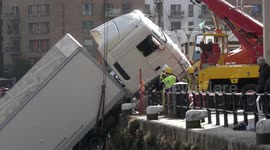 Drone footage from Bristol, UK as recovery workers lift truck out of harbour