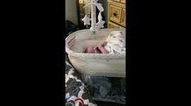 Baby boy crying himself to sleep.