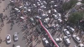 Sudan: Drone footage shows giant national flag as pro-transitional government and rival groups protest In Khartoum