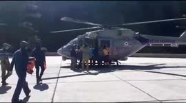 Goverment officials rescue 11 trekker with the help oh helicopter in Northern India.