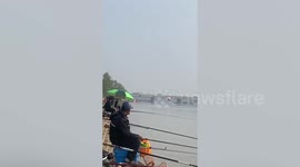 Chinese fighter jet crash lands in river as pilots parachute into water