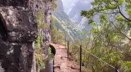 Madeira trekking. Famous levada, beautiful landscape, mountains and Atlantic Ocean.