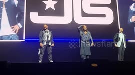 Listen to the deafening screams as boy band JLS return to stage for first time in 8 years