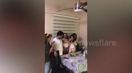 Girl throws tantrum after dad blows out candles on his birthday cake