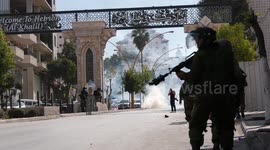 Palestinian protesters clash with Israeli forces following a demonstration calling for the release of Palestinian prisoners on hunger strike in Israeli jails