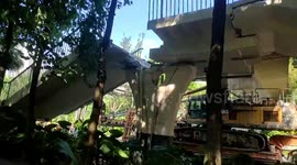 Footbridge collapses after being crashed into by truck in southern China