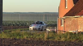 Rally car goes off the road. Spectator wants to push him back, but the car moves forward. whether he thinks there is a lot of money in the las vegas car