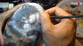Italian artist draws decorates rocks with detailed portraits of cats