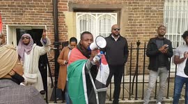 Demonstrators gather outside Sudanese embassy in London after military coup