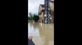 Floods in Vietnam force locals to navigate through submerged streets on rafts