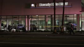 Car flipped and crashed into hydrant, BMW dealership shattered in Los Angeles, CA, US