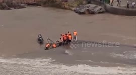 Rescuers in Vietnam save seven men trapped in fast-flowing floodwaters